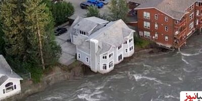 (ویدیو) لحظه سقوط وحشتناک یک خانه به رودخانه در آلاسکا